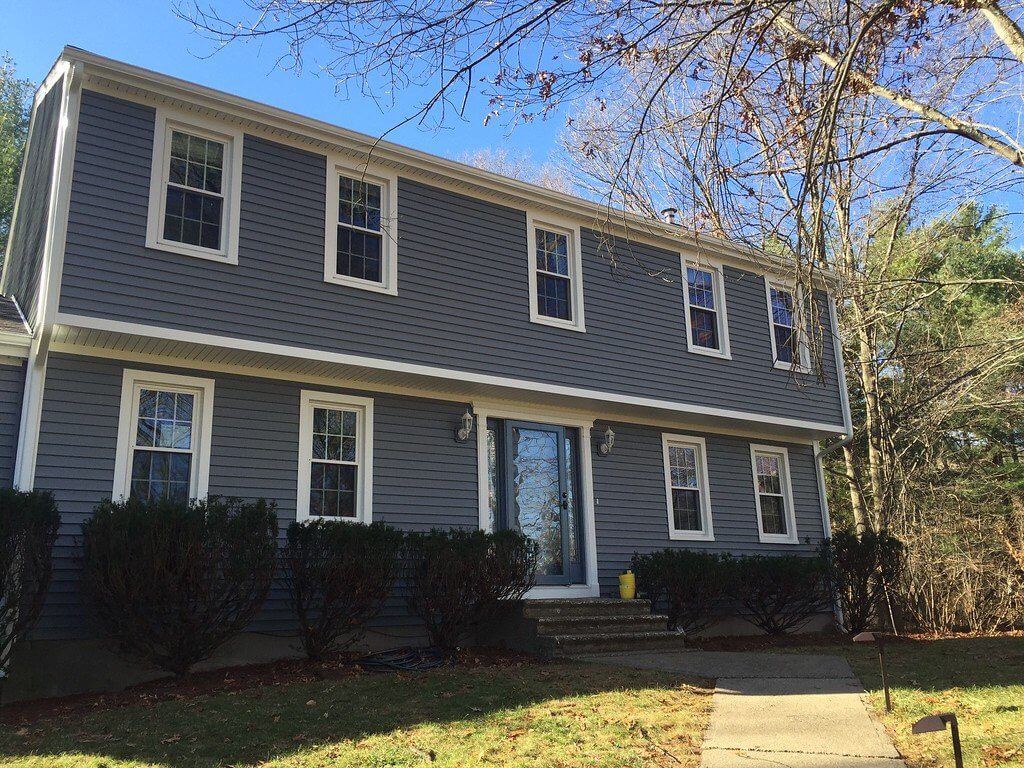 Gray Vinyl Siding and Window Installation on a Raised Ranch Home in MA